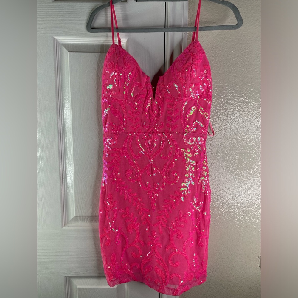 Hot pink sequins dress.